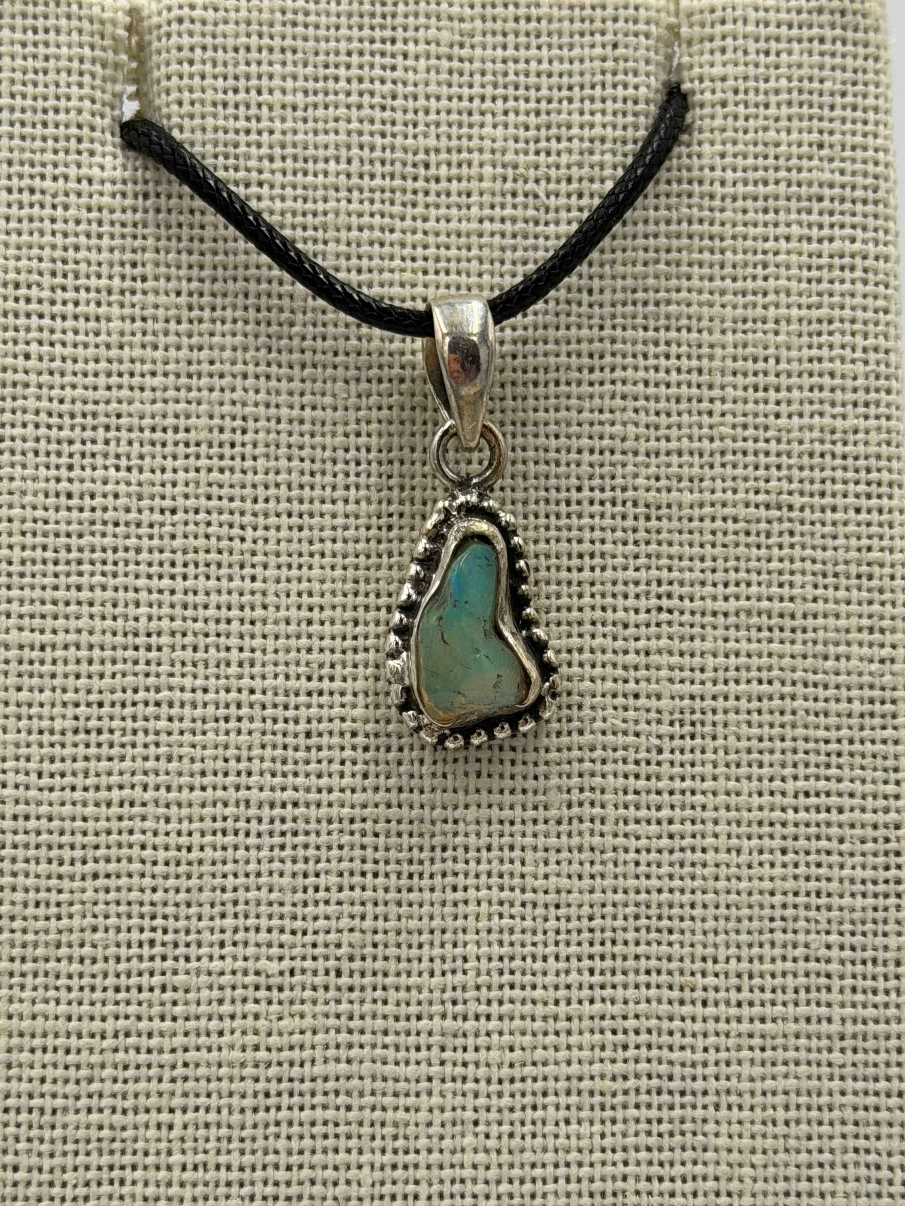Sterling Silver Bezeled Raw Ethiopian Opal Pendant