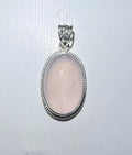 Oval Rose Quartz Pendant with Beveled Border in Sterling Silver